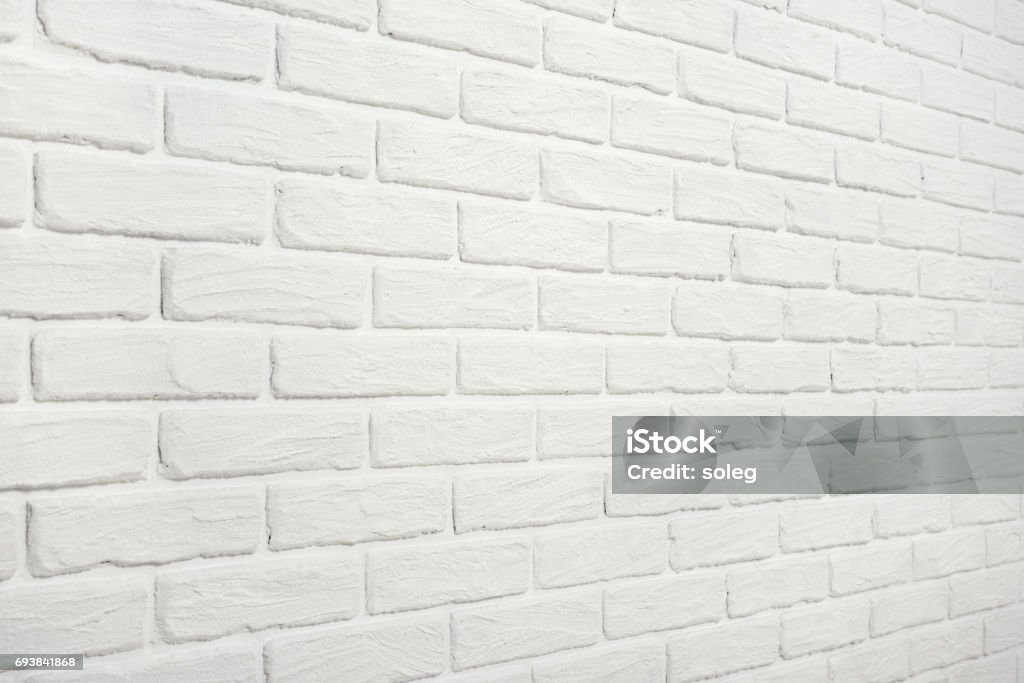 white brick wall, angle view, abstract background photo Wall - Building Feature Stock Photo