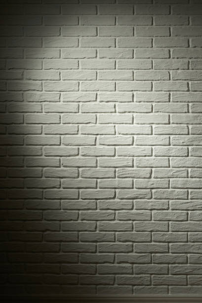 istock white brick wall with light effect and shadow, abstract background photo 693844330