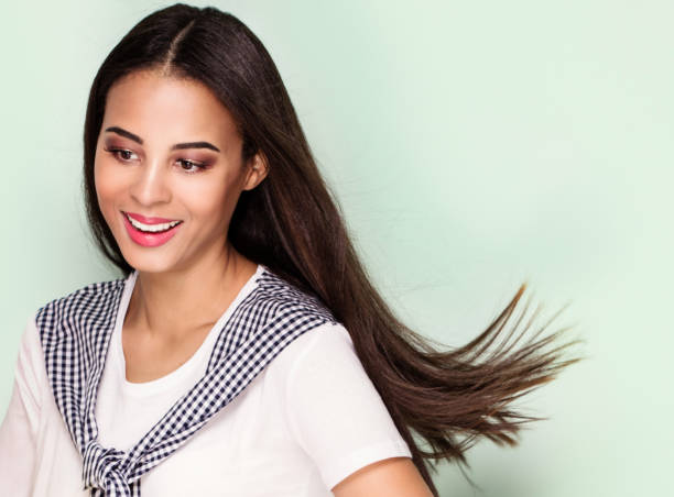 istock Happy young woman posing,. 693844896