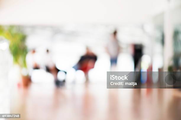 Abstract Blur Background Of People In Business Office Hall Or Corridor Stock Photo - Download Image Now