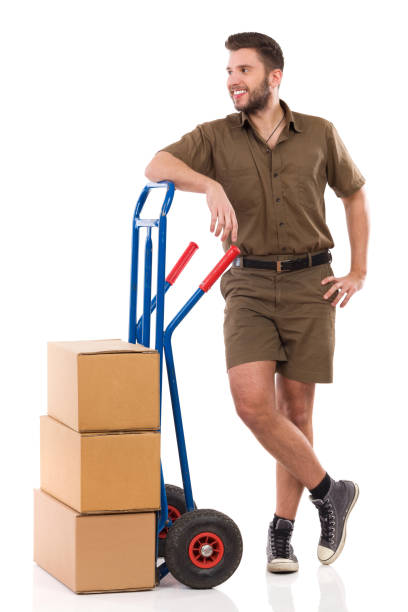 istock Relaxed Messenger Is Leaning On A Push Cart 693853700
