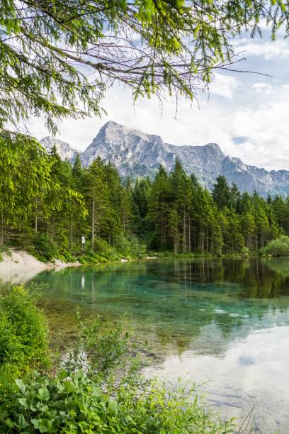 istock Alps mountains and lake in Almsee in Austria. 693857922
