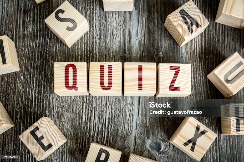 Quiz Wooden Blocks with the text: Quiz Question Mark Stock Photo