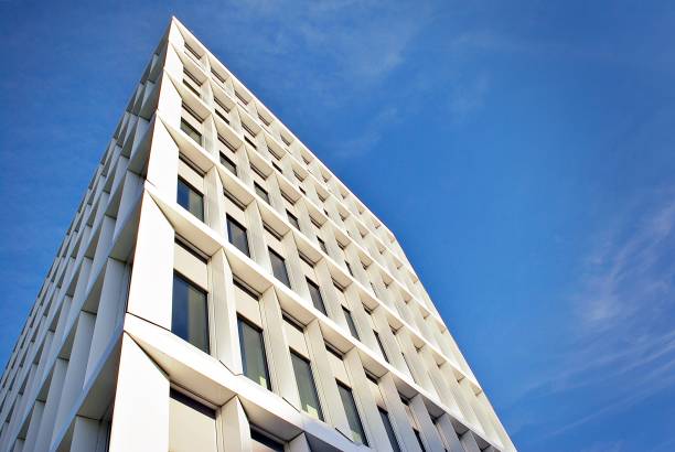istock Modern building. Modern office building with facade of glass 693864154