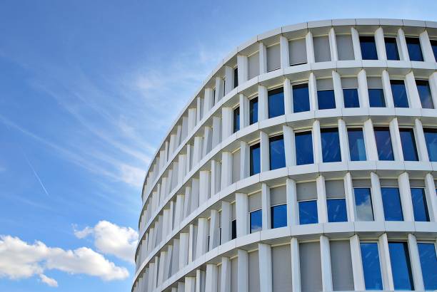 istock Modern building. Modern office building with facade of glass 693864242