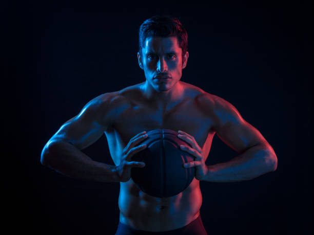 istock Hispanic Basketball Player In Surreal Color 693866952