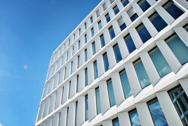 istock Modern building. Modern office building with facade of glass 693867546