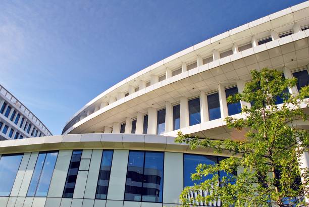 istock Modern building. Modern office building with facade of glass 693867728