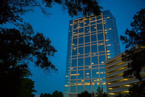 istock Downtown city skyscraper at night 693870598