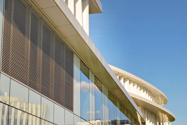 istock Modern building. Modern office building with facade of glass 693874008