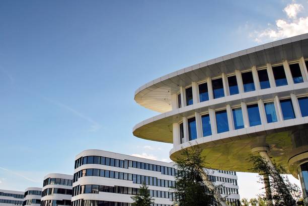 istock Modern building. Modern office building with facade of glass 693874504