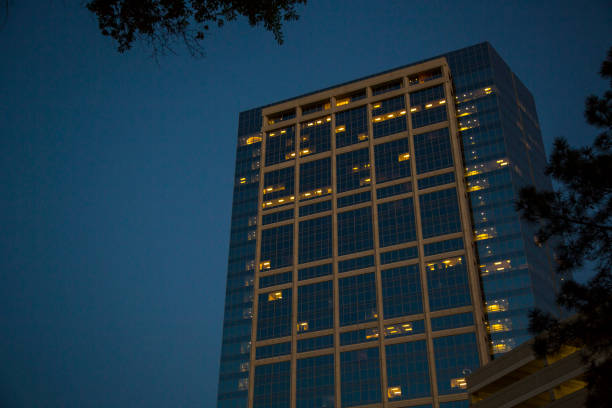 istock Downtown city skyscraper at night 693875080