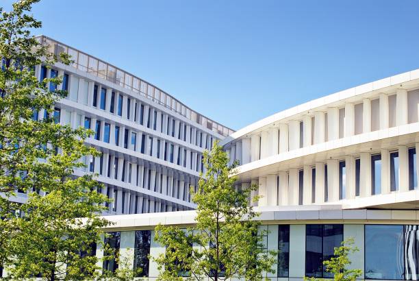 istock Modern building. Modern office building with facade of glass 693875412