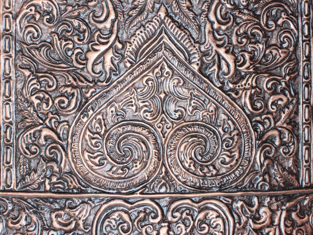 istock The art and pattern of carving silverware. 693877550