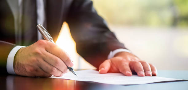 Signing Legal Document stock photo