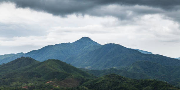 istock clouds over the moutain near rain storm 693884016