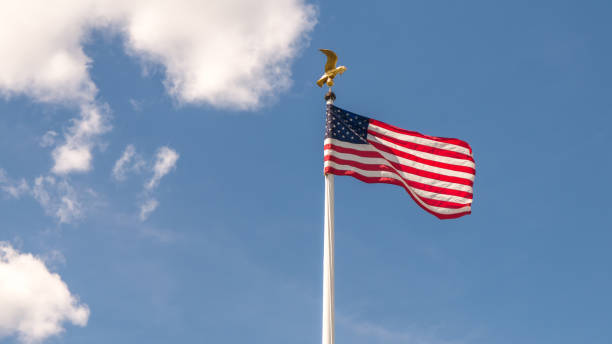 istock US American flag on a sunny day 693894588
