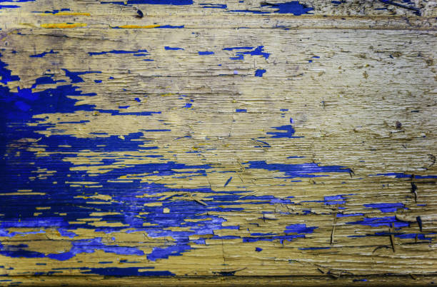 istock Colored wood background with peeling old paint 693896936
