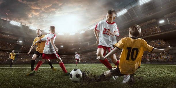 istock Soccer kids players in action in 3D dramatic stadium 693905308