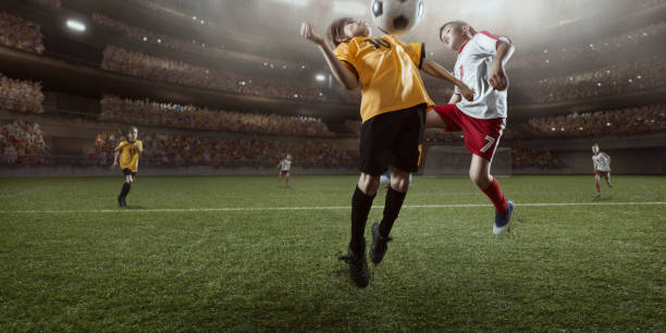 istock Soccer kids players in action in 3D dramatic stadium 693905336
