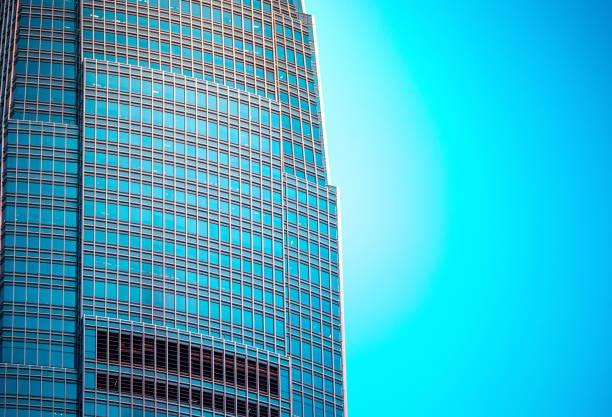 istock Modern office building close up in sunlight 693905392