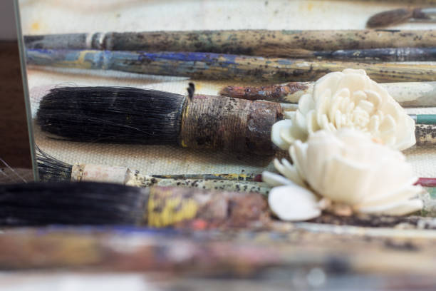 istock Artistic scene with old painter's brushes 693905568