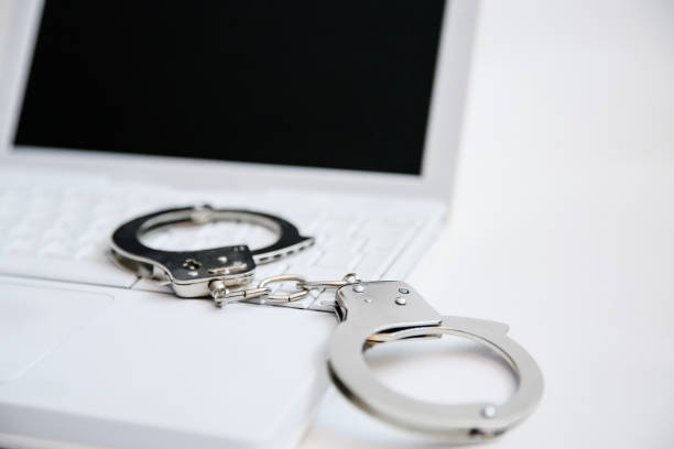 istock handcuffs for crime online 693905584