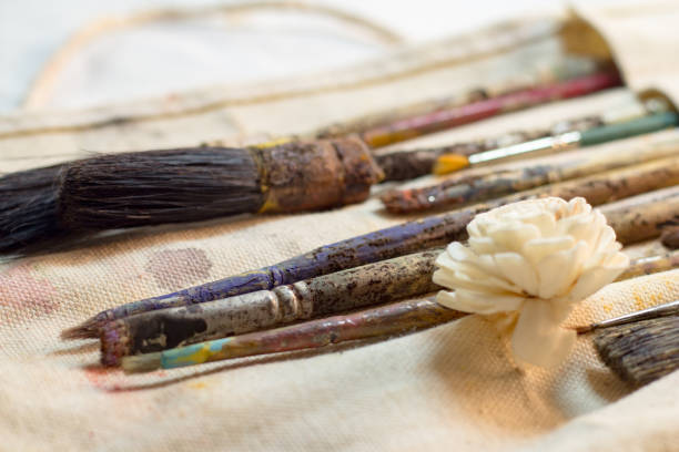 istock Artistic scene with old painter's brushes 693905668