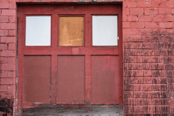 istock Red wall of abandoned building 693907940