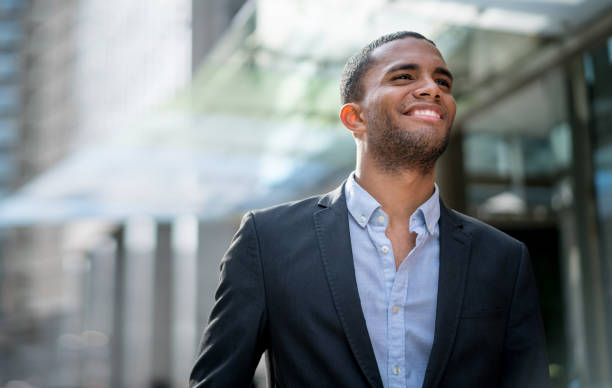 istock Happy business man outdoors 693916522