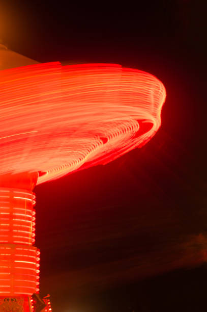 istock Local State Fair Carnival Ride Long Exposure Red Streaks 693918990