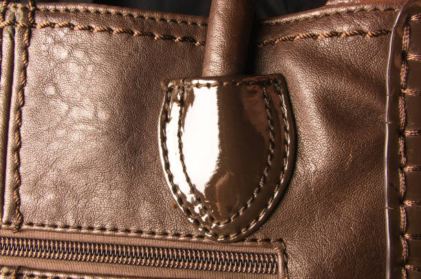 istock seams on leather hand bag 693919834