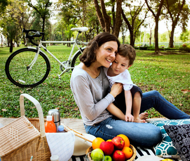 istock Family Picnic Outdoors Togetherness Relaxation 693927982