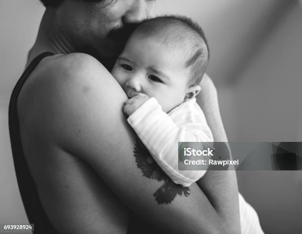 Daddy Carrying His Baby Family Emotion At Home Stock Photo - Download Image Now - Baby - Human Age, Bonding, Care