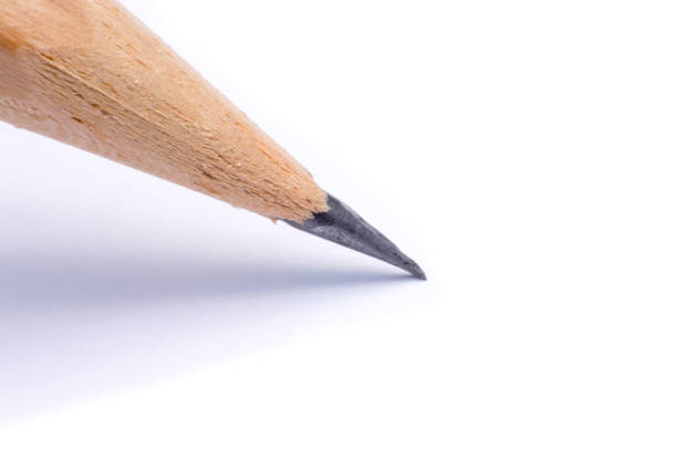 istock close up wooden pen isolated on white background 693928964