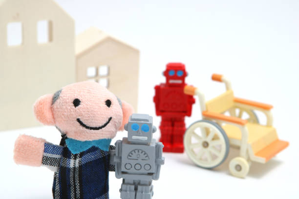 istock Senior man and robots with wheelchair on white background. 693928986