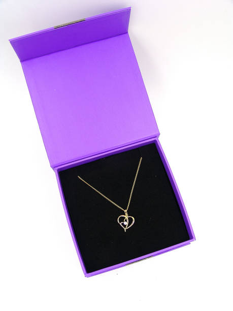 istock Gold Necklace with heart pendant in a gift box 693937300