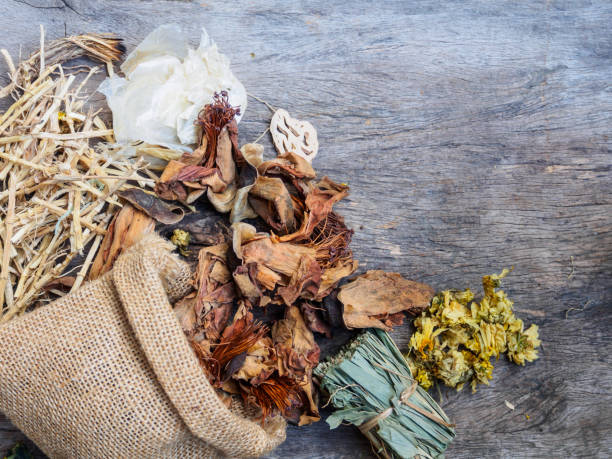 istock Top view dried herbal natural on wooden background 693940980