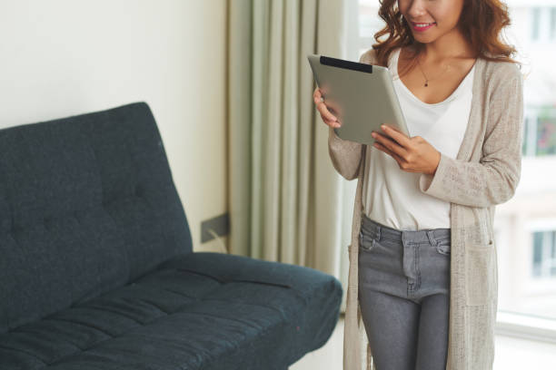 istock Girl with digital tablet 693947188