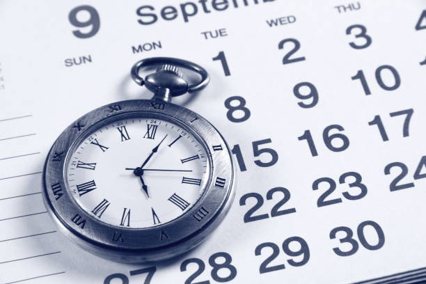istock Pocket watch and calendar 693952584