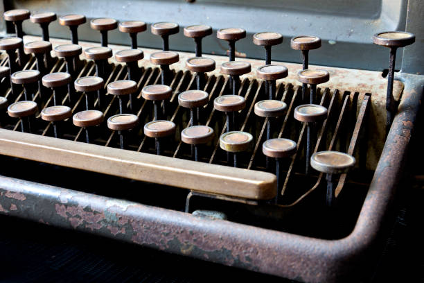 istock Old typewriter  in antique keys close up, selective focus. 693952768