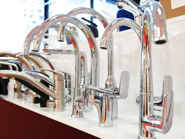 istock Modern kitchen water faucets in store 693953030