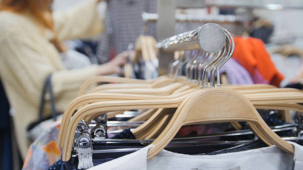 istock Picture hangers with women's clothes 693953732