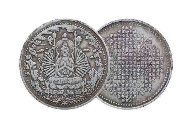 istock Old Chinese coin with guanyin isolated on white background. 693962364