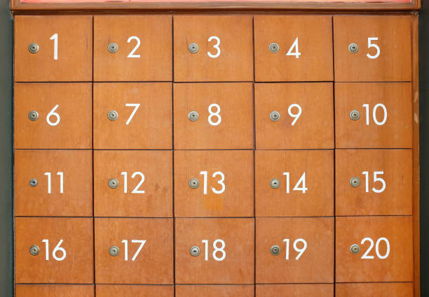 istock Old style wooden Mailboxes with key and number. 693971892