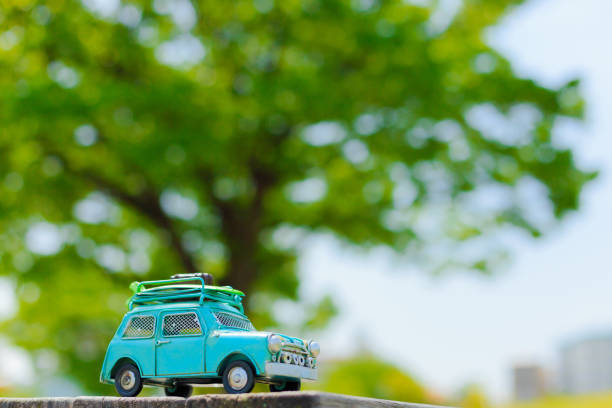 istock Car model and natural green 693972020