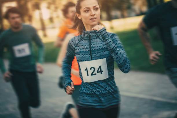 istock Woman in a running race 693974806