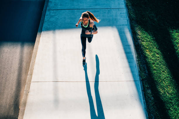 istock Woman jogging in the city 693974852