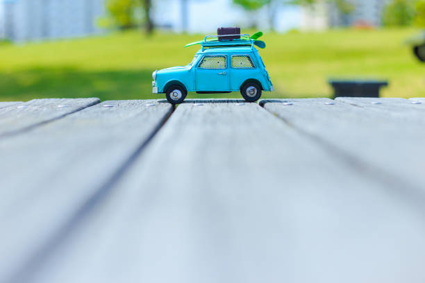 istock Car model and natural green 693975158