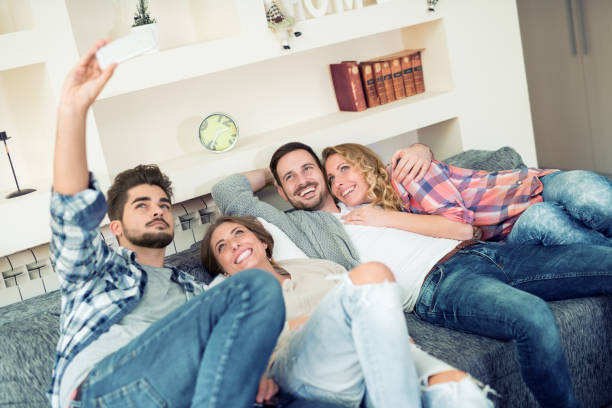 istock Friends having fun at home 693975178